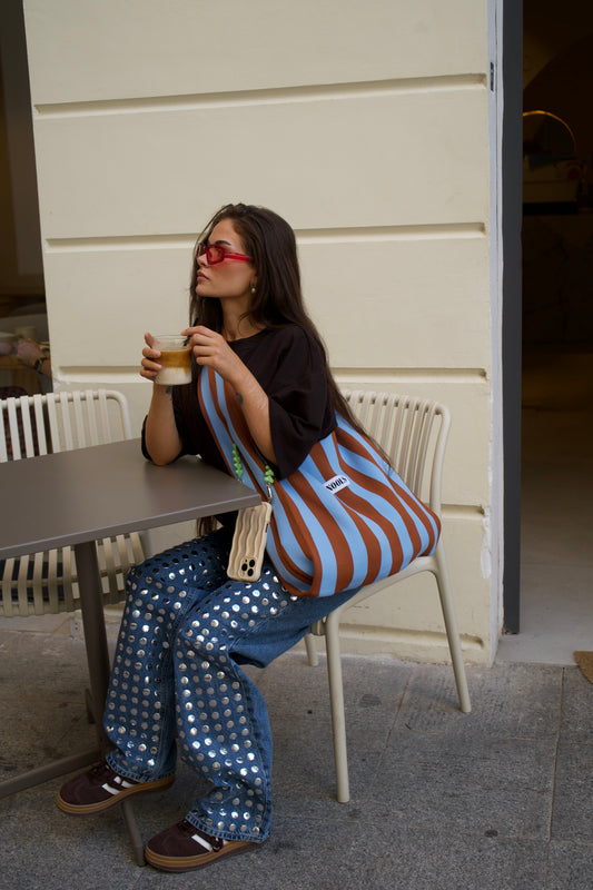 Close up Riva bag kleurrijke tas in het blauw met bruin 