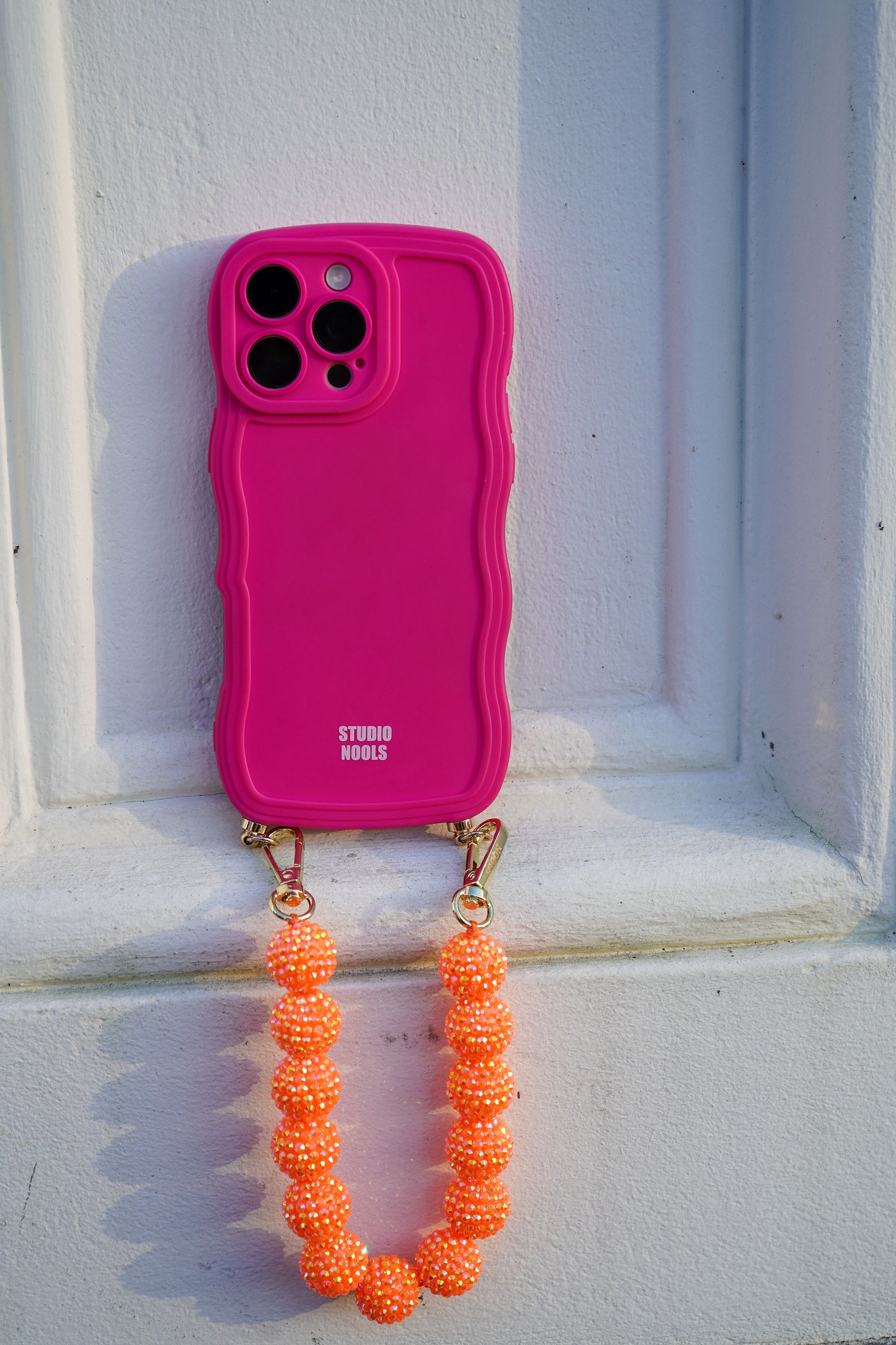 Glitter phone cord orange